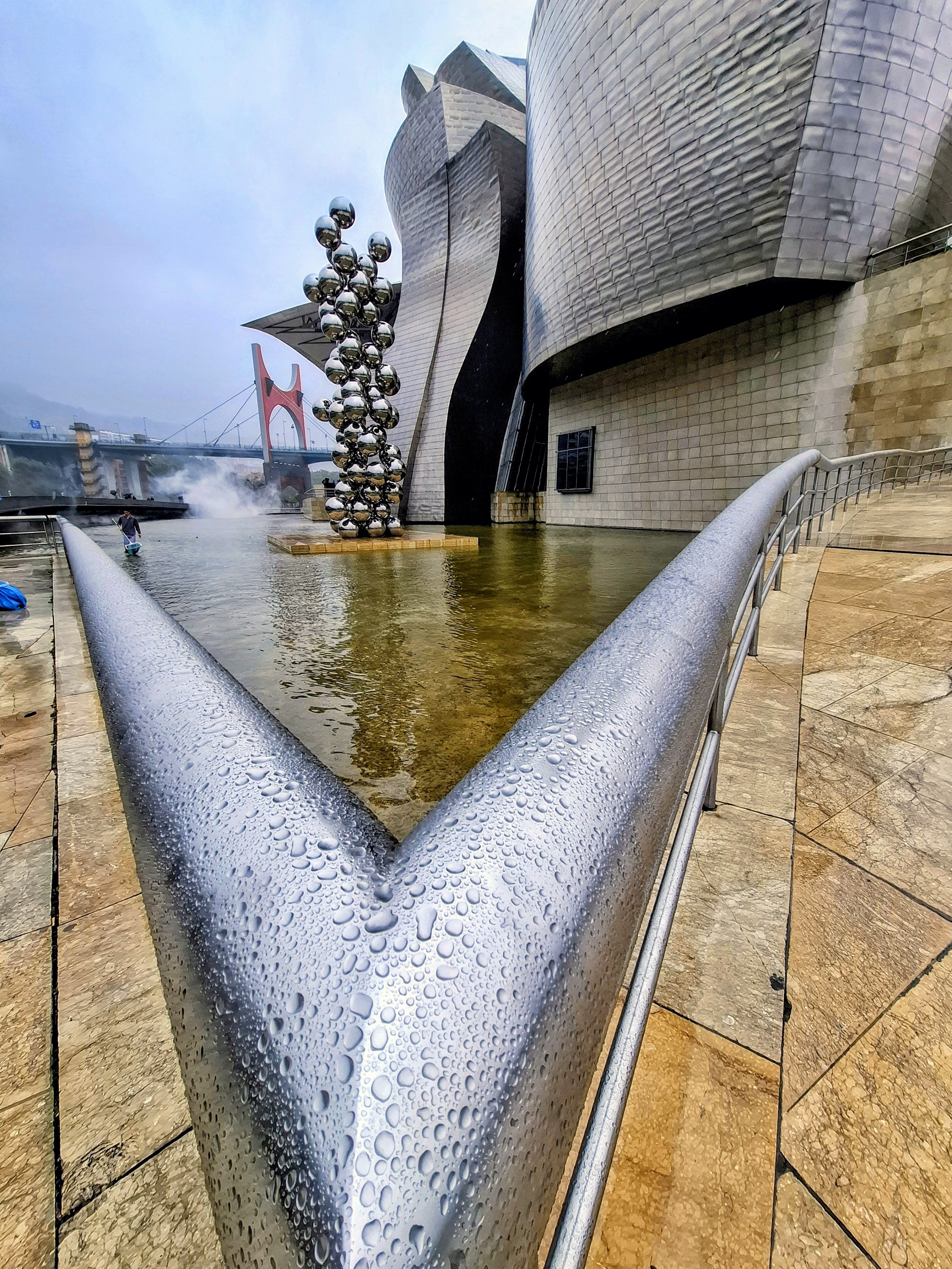 Guggenheim Museum with Anish Kapoor's Tall Tree and the Eye and the Puente de la Salve